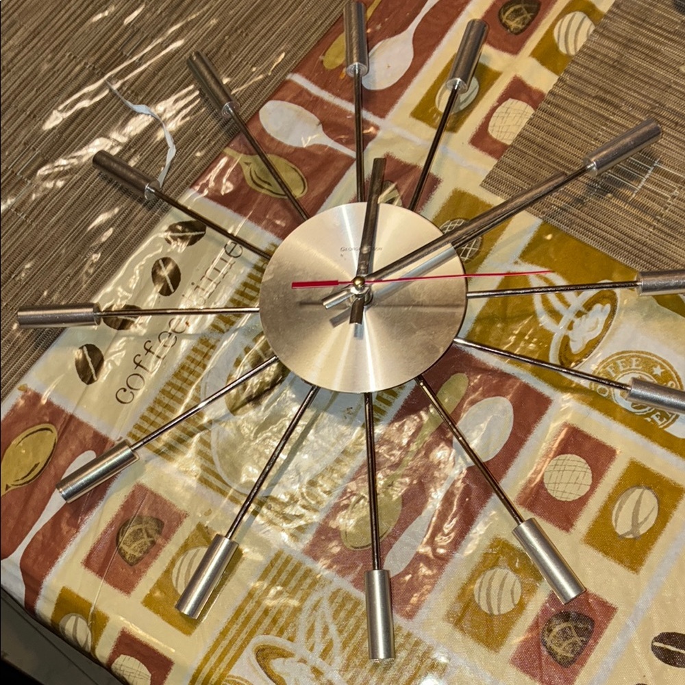 Modern Silver Wall Clock with Red Hands